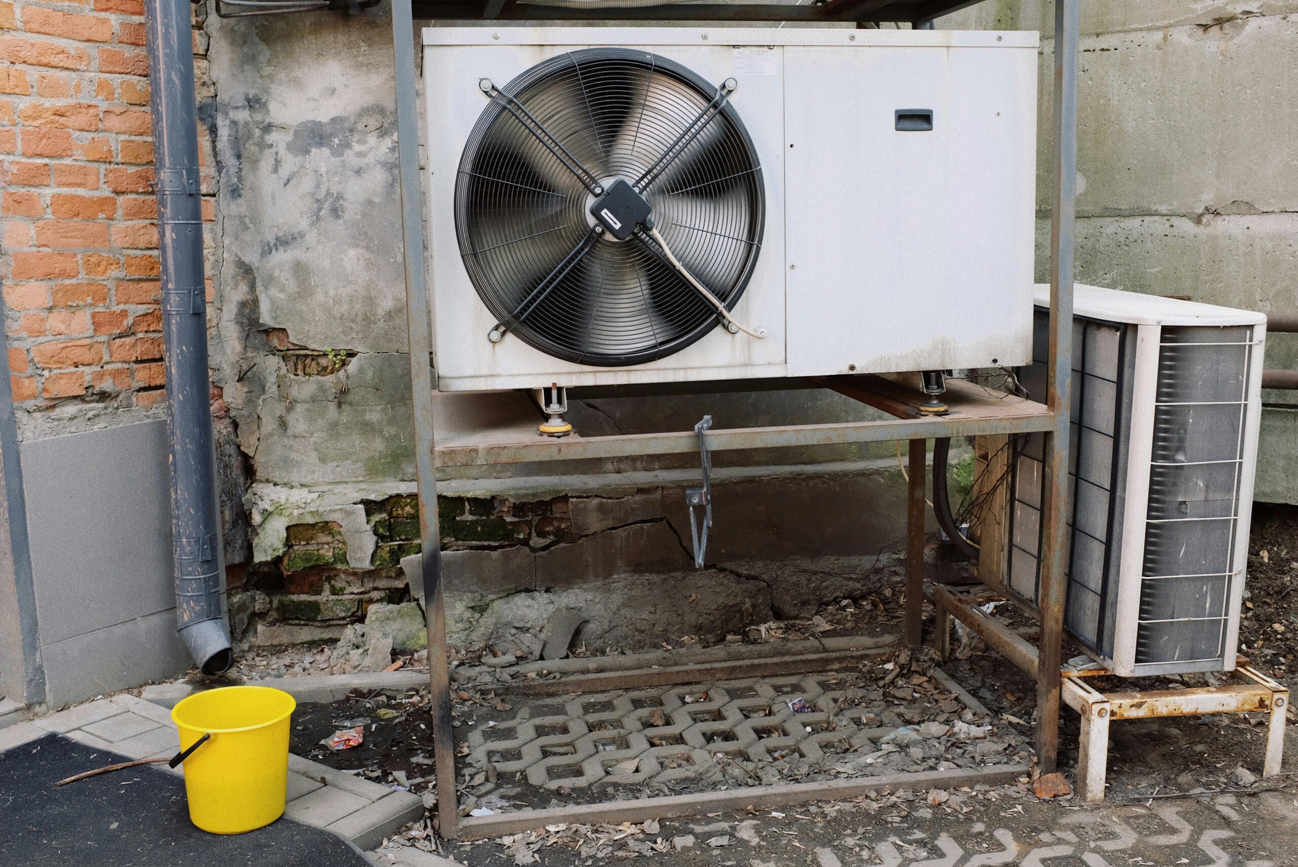 Technician inspecting AC unit