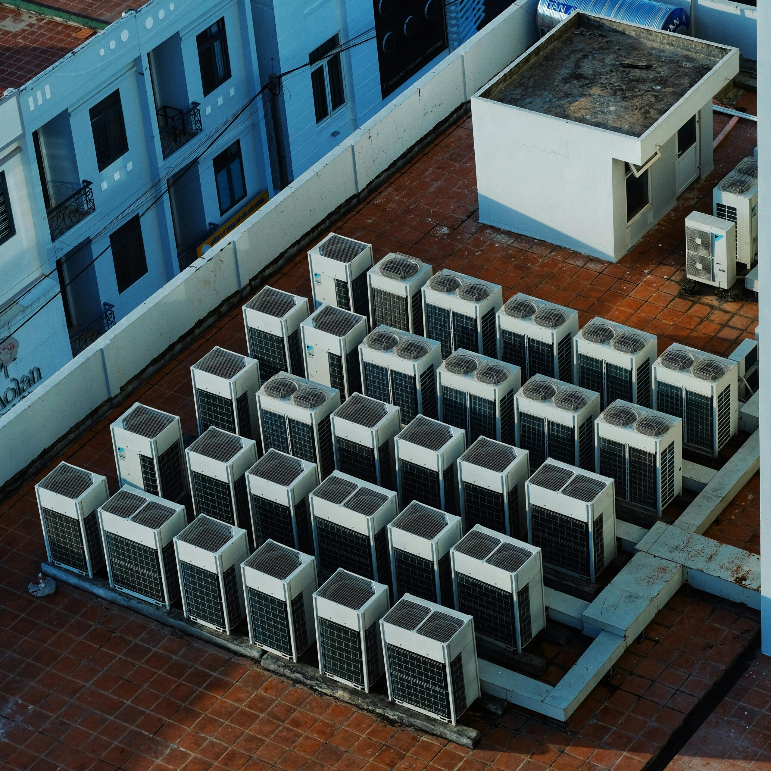 Technician checking refrigerant levels